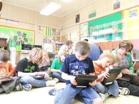 students with iPad in the classroom