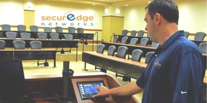SecurEdge Engineer working in large conference room
