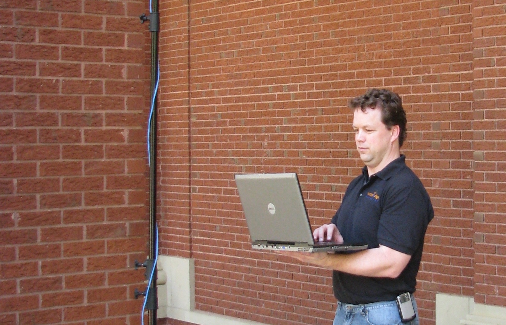 Network Engineer performing outdoor wireless survey